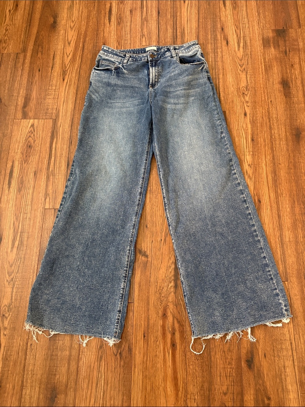 High-Rise Wide-Leg Jeans with Distressed Hem in Medium Blue